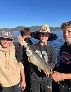 A group of 4 people fishing in California