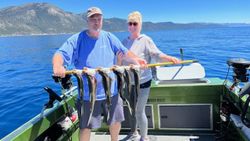 Two people enjoying fishing in California