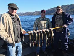 Three people enjoying a fishing trip in Tahoe Vista