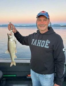 One person fishing at Tahoe Vista