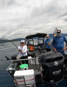 Three people enjoying a fishing trip in California