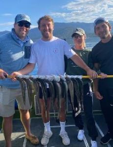 Four people enjoying a fishing trip in Tahoe Vista