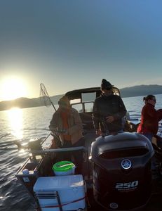 Anglers enjoying a scenic fishing trip in Tahoe Vista