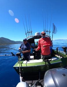 Four people enjoying the scenic view at Tahoe Vista