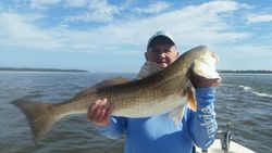 A person fishing in FL