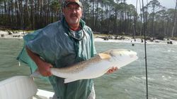 A person fishing in Apalachicola