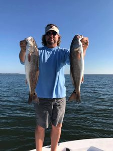 Two redfish caught in Apalachicola, Florida during a fishing cruise