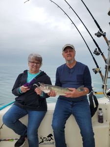 2 people fishing at the lakeside in Marblehead