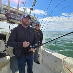 Great day on the water with jigging and trolling techniques. Cloudy afternoon conditions perfect for fishing.