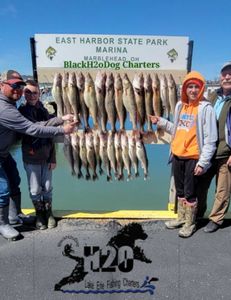 4 people fishing at the lakeside in Marblehead