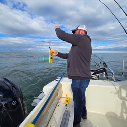 Great afternoon on the water with multiple techniques - jigging, trolling, and bait casting setup ready to go!