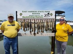 Two anglers fishing at the lakeside in Marblehead