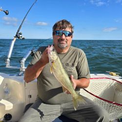 Angler fishing at lakeside in Marblehead