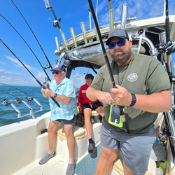 Partly cloudy skies set the stage for an epic day of jigging and trolling!