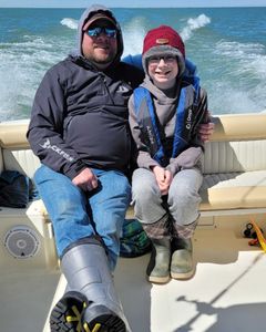 Two people enjoying a fishing trip at Lakeside Marblehead