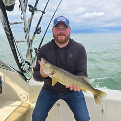 Nice walleye using jigging and trolling techniques. Cloudy afternoon conditions made for exciting fishing.