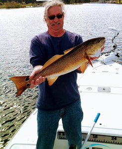 An angler with a big fish caught in Jacksonville