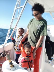 Boating adventure on the water at Pensacola Beach FL with safety equipment visible on deck