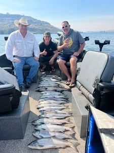 Anglers holding 2 big fish in WA