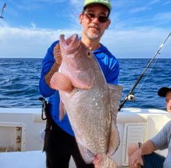 Fisherman with 21-inch catch on Danford St