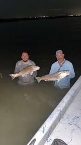 Two anglers fishing in Matagorda