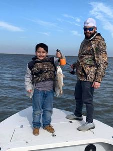 2 people fishing in TX