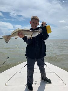 A spotted weakfish measuring 23 inches caught while fishing in Matagorda