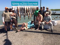 Group of 11 people fishing in Rockport