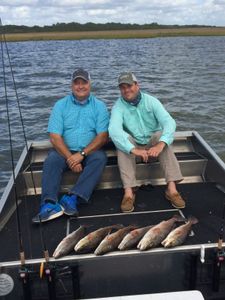 Two great barracuda fish caught by two people in Rockport