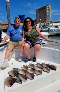Two people fishing by the Atlantic City coast