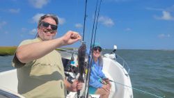 Anglers in NJ enjoying a fishing adventure