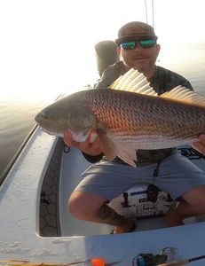 A person fishing in Jacksonville, Florida