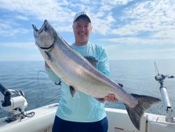 Angler with a 34-inch fish on their line in NY