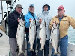 4 Chinook Salmon and Coho Salmon caught while fishing in NY