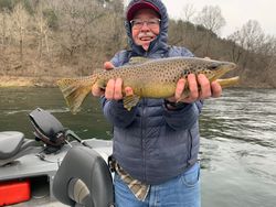 Angler catching fish in Gassville