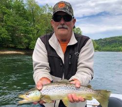 Fisherman with sea trout in AR