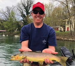 Angler with a sea trout fish in AR