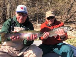 two rainbow trout fish caught in ar