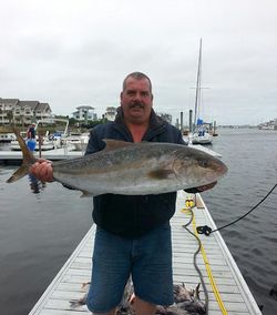 A single fisherman at Carolina Beach