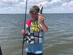 Angler enjoying a great day of fishing in Midway