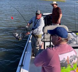 Two people fishing at Midway