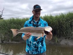 Angler catches a 24-inch redfish in GA