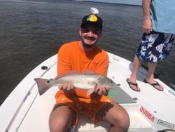 Redfish measuring 18 inches, fishing at Midway location