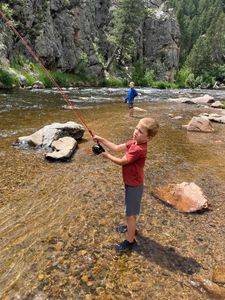Two people enjoying a fishing trip in Colorado