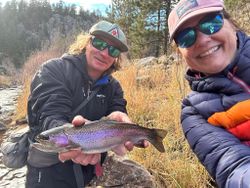 Angler with rainbow trout caught in Colorado