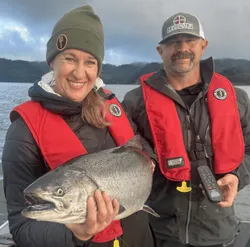 Two people enjoying a fishing tour in Milwaukie