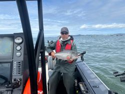 Two people fishing for Chinook Salmon in Milwaukie