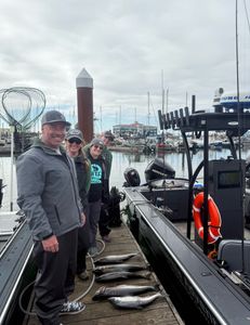 Four people enjoying a fishing tour in Oregon