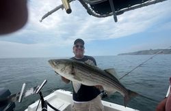 Reeling in Big Ones Near Point Judith - Stripers