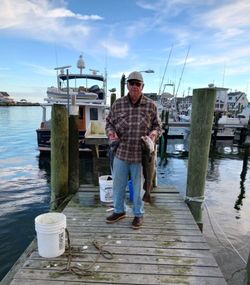 A lone angler fishing in RI
